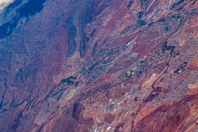 Aerial view of rocky mountains on sunny day