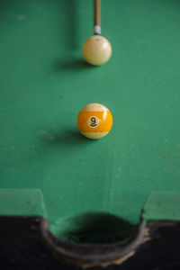 Close-up of ball on pool table