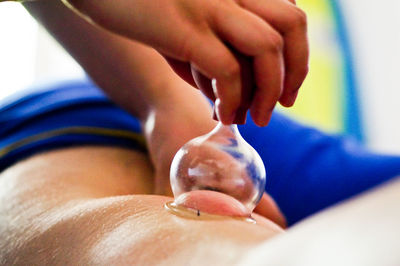 Close-up of hand holding hands