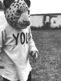 Close-up of boy wearing hat