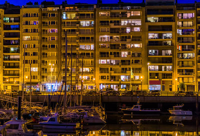 View of illuminated buildings at night