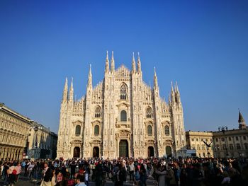 Group of people in front of cathedral