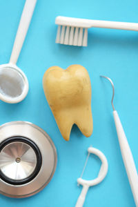 Close-up of dental equipment on table