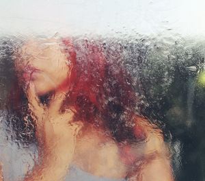 Close-up of water drops on glass window