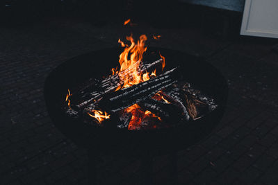 High angle view of fire in the dark