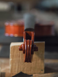  a classic violin on a bench