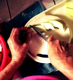 Close-up of man preparing food