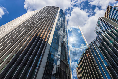 Low angle view of modern buildings against sky