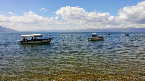 Boat in sea against sky