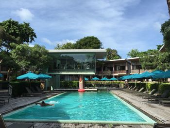 View of swimming pool against blue sky