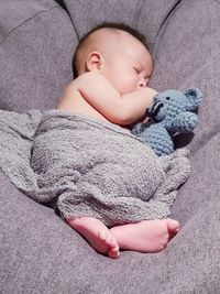 High angle view of baby sleeping