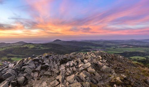 Scenic view of mountains against sky during sunset