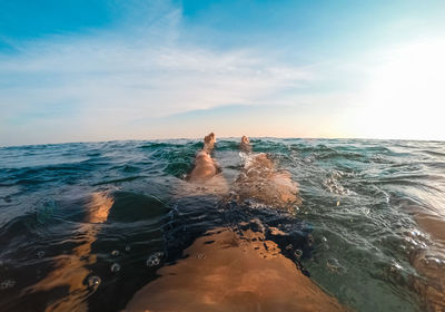 Sunset swimming in first person view