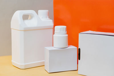 Close-up of cleaning equipment on white background