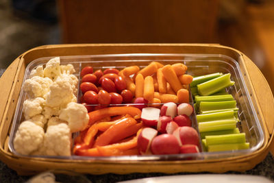 A relish tray is a platter of fresh veggies thats served up before family dinners