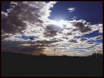 Scenic view of landscape against cloudy sky