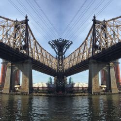 Low angle view of bridge over river