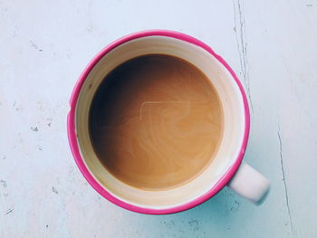 High angle view of coffee in cup on table