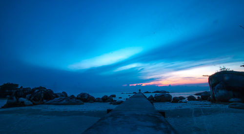 Rocks against blue sky during sunset