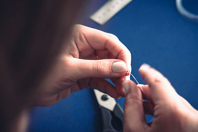 Close-up of people holding hands