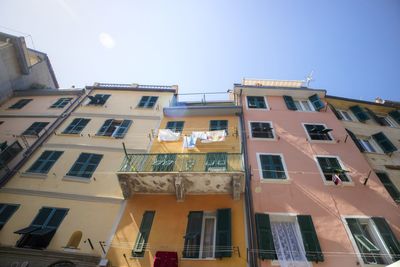 Low angle view of building against clear blue sky