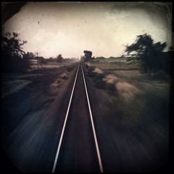 Railroad tracks on road