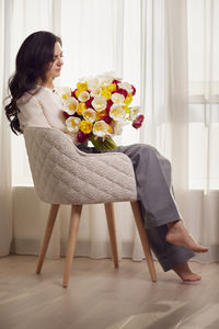 Young woman with bouquet