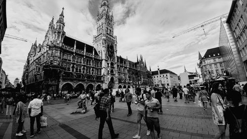 People in front of building