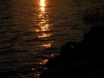 Scenic view of sea against sky at sunset