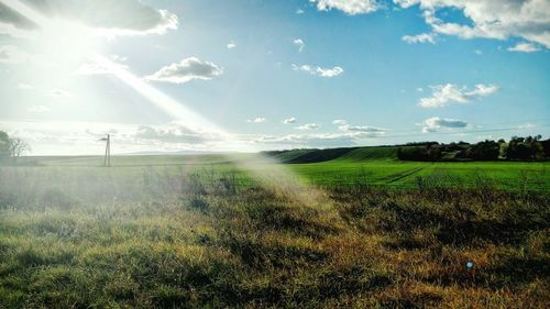 Scenic view of field against sky