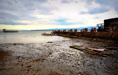 Scenic view of sea against cloudy sky