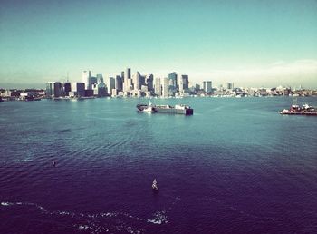 City skyline with sea in background