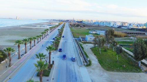 High angle view of road by sea against sky