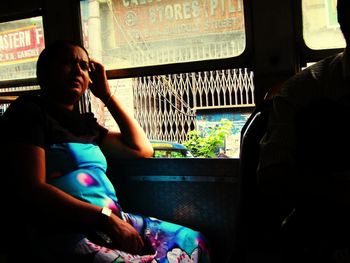 Rear view of woman looking at restaurant