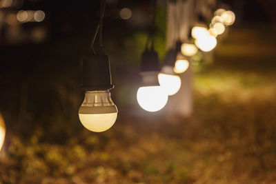 Close-up of illuminated light bulb