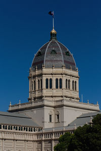 Royal exhibition building against clear blue sky in city