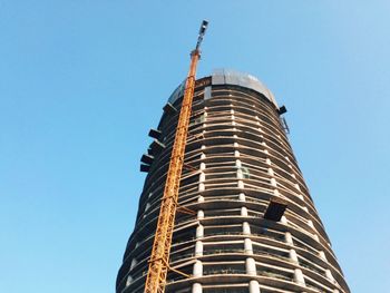 Low angle view of skyscraper against clear sky