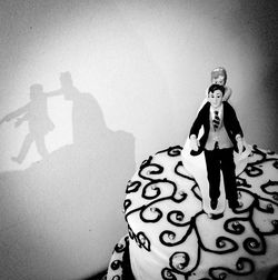 Woman standing on wall