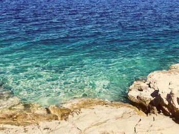 High angle view of rocks on beach