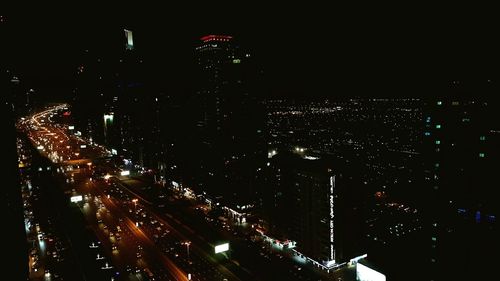 High angle view of illuminated city at night