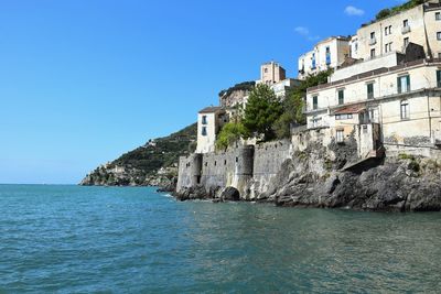 Scenic view of sea against clear blue sky