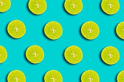 Directly above shot of oranges on white background