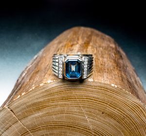 Close-up of ring on wood