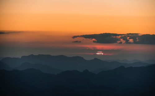 Scenic view of dramatic sky during sunset