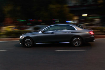 Car moving on road at night