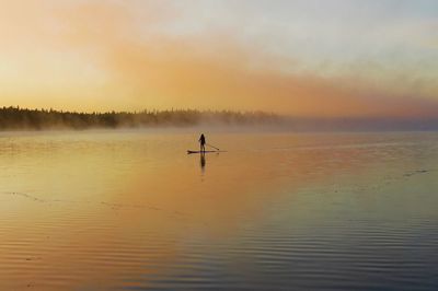 Scenic view of sea at sunset