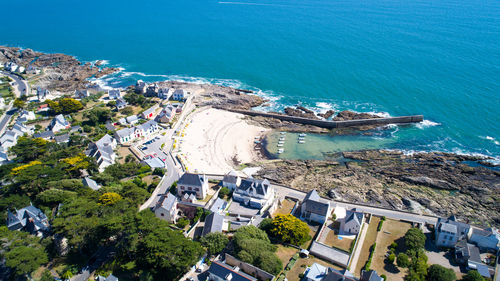 High angle view of town by sea