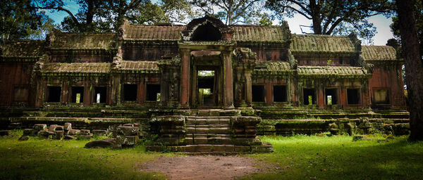 Built structure with trees in foreground