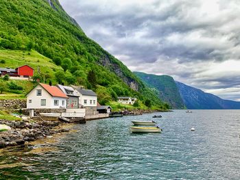 Scenic view of houses and buildings against sky