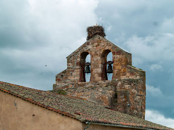 Low angle view of old building against sky